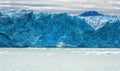 A giant chunk of ice breaking off the magnificent Perito Moreno Glacier in Patagonia, Argentina Royalty Free Stock Photo