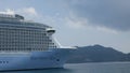 Giant cruise ship docked in the middle of ocean of Patong sea at Phuket under sunny day vacation holiday time. Luxuary Cruise ship