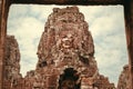 Giant face of bodhisattva or Buddha on stone towers of the 12th century Bayon temple, Cambodia. Historical landmark Royalty Free Stock Photo