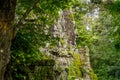 Giant face of temple gate around angkor wat temple area Royalty Free Stock Photo