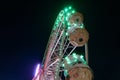 giant Ferris wheel carousel shines in the night sky Royalty Free Stock Photo