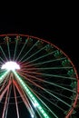 giant Ferris wheel carousel shines in the night sky Royalty Free Stock Photo