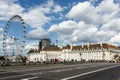 Giant Ferris wheel and county hall of the River Thames Coca-Cola London eye