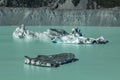 Giant floating icebergs on Tasman Glacier Lake in Aoraki Mount Cook National Park, South Island of New Zealand Royalty Free Stock Photo