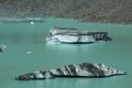 Giant floating icebergs on Tasman Glacier Lake in Aoraki Mount Cook National Park, South Island of New Zealand Royalty Free Stock Photo