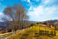 Giant forestry mountains behind wooden fence in highland