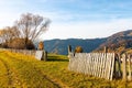 Giant forestry mountains behind wooden fence in highland