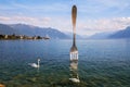 Giant fork in water of Geneva lake. Vevey, Switzerland