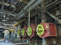 Giant gas-burners, glitter tubes, equipment, cables and piping inside a modern industrial power plant Royalty Free Stock Photo