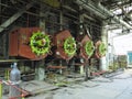 Giant gas-burners, glitter tubes, equipment, cables and piping inside a modern industrial power plant Royalty Free Stock Photo