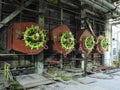 Giant gas-burners, glitter tubes, equipment, cables and piping inside a modern industrial power plant Royalty Free Stock Photo