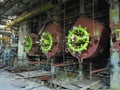 Giant gas-burners, glitter tubes, equipment, cables and piping inside a modern industrial power plant Royalty Free Stock Photo