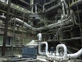 Giant gas-burners, glitter tubes, equipment, cables and piping inside a modern industrial power plant Royalty Free Stock Photo