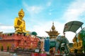 Giant Golden Buddha statue with blue sky Thailand Royalty Free Stock Photo