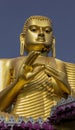 Giant Golden Buddha Statue at Golden Temple of Dambulla in Sri Lanka Royalty Free Stock Photo