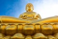 Giant golden sitting Buddha statue Royalty Free Stock Photo