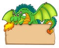 Giant Green Dragon Holding Board