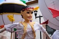 Giant groom doll walking in the streets of Oaxaca during the traditional Mexican wedding parade