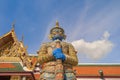 Giant guardian statue of Golden pagoda at Temple of the Emerald Buddha in Bangkok, Thailand. Wat Phra Kaew and Grand palace in old Royalty Free Stock Photo