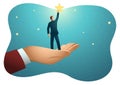 Giant hand helping a businessman to reach out for the stars Royalty Free Stock Photo