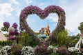 Giant heart decorated with flowers in botanical Dubai Miracle Garden with different floral fairy-tale themes in Dubai city, United
