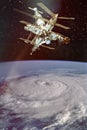 Giant hurricane seen from the space and iss above Royalty Free Stock Photo