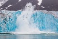 Giant iceberg calving from the Glacial wall Royalty Free Stock Photo