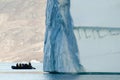 Giant Iceberg with Inflatable Boat Scale
