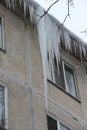 Giant icicles hanging from the roof