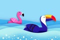 Giant inflatable Fantasy Pink Flamingo and Toucan paper cut style. Origami Pool float toys. Crystal clear blue sea water