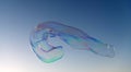 Giant iridescent soap bubble fly in clear blue sky, soap-bubble Royalty Free Stock Photo