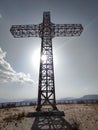 Giant iron cross on the top of the mountain
