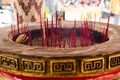 Giant joss stick pot with red incense sticks Royalty Free Stock Photo