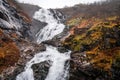 Giant Kjosfossen waterfall in autumn