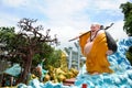 Giant Laughing Buddha statue at Haw Par Villa theme park in Singapore. Royalty Free Stock Photo