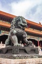 Giant Lion statue fronts Supreme harmony Gate at Forbidden City, Beijing, China Royalty Free Stock Photo
