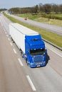 Giant lorry speeding through countryside Royalty Free Stock Photo