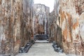 A giant masoned standing Buddha statue without head in a temple in the royal ancient city of Polonnaruwa in Sri Lanka Royalty Free Stock Photo