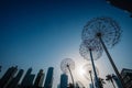 Giant metal dandelion sculpture in the a park in Dubai