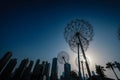 Giant metal dandelion sculpture in the a park in Dubai