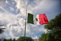 Giant mexican flag flies in the wind in Cancun