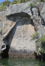 The giant Mine Bay Maori rock carving of Ngatoroirangi on Lake Taupo, New Zealand