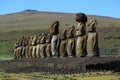 The giant Moai statues of Ahu Tongariki with Poike volcano in background, Archaeological site in Easter Island Royalty Free Stock Photo
