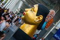 Giant model of a Thai womans head, near big mall Royalty Free Stock Photo