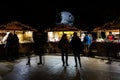 Giant moon behind Christmas market