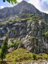 Giant Mountain vertical face with huge rock formation of mighty Indian Himalayas. Royalty Free Stock Photo