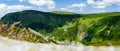 Giant Mountains, mountain panorama from the hiking trail to the top of Sniezka. View of the vast mountain slopes and trails Royalty Free Stock Photo