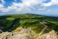 Giant Mountains, mountain panorama from the hiking trail to the top of Sniezka. View of the vast mountain slopes and trails Royalty Free Stock Photo