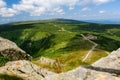 Giant Mountains, mountain panorama from the hiking trail to the top of Sniezka. View of the vast mountain slopes and trails Royalty Free Stock Photo