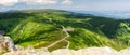 Giant Mountains, mountain panorama from the hiking trail to the top of Sniezka. View of the vast mountain slopes and trails Royalty Free Stock Photo